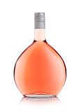 Luxury round bottle of pink rose wine on white
