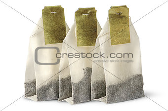 Three tea bags with labels
