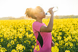 Mixed Race African American Girl Teenager Runner Drinking Water 