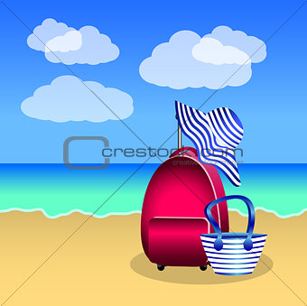 Pink red suitcase, beach bag and hat with blue stripes on the be