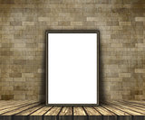 3d mock up of a blank picture on a wooden table against a brick 