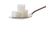 Three cubes of sugar on a spoon