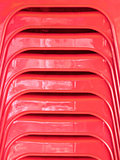 Closeup of the plastic chair stack.