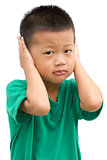 Asian child covered his ears