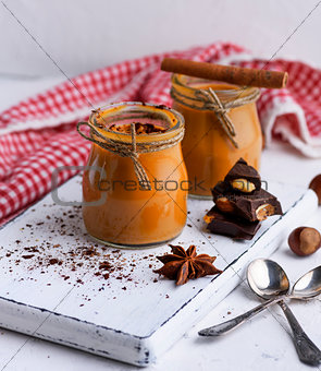 Caramel dessert Toffee in a glass jar 