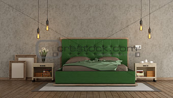 Master bedroom with green double bed