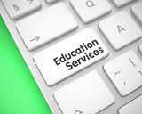 Education Services - Text on White Keyboard Button. 3D.