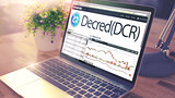 The Dynamics of Cost of DECRED onLaptop Screen. Cryptocurrency C