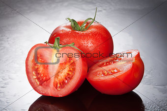 Tomatoes On A Glass Background