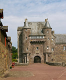 The turretted gatehouse of the Chateau de Trecesson