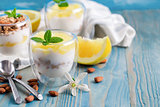 Yogurt with granola and grapefruit background