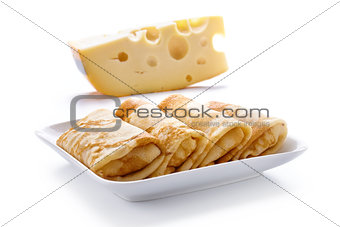 pancakes with cheese are isolated on a white background