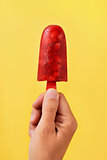 man with a homemade ice pop in his hand