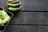 Fresh cucumbers on a old wooden kitchen table
