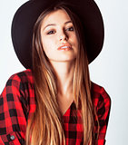 young pretty brunette girl hipster in hat on white background ca