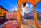 Ancient Italian square arches and architecture in town of Udine