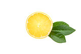 Half of a fresh, clean, glowing yellow lemon with green leaves on a white background. isolated.
