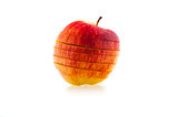 one sliced red juicy apple on a white background