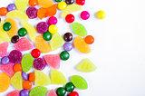 Scattered colored candy on a limited 