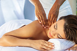 Woman At Health Spa Having Relaxing Outdoor Massage
