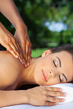 Woman At Health Spa Having Relaxing Massage