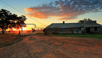 Farm buildings at sunset