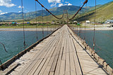 Old suspension bridge. Altai,  Russia.