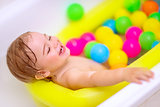 Little child enjoying bathing
