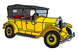 The vintage yellow convertible