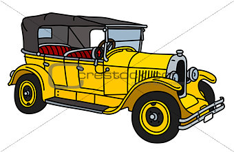 The vintage yellow convertible