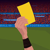 Close up hand holding yellow card