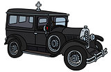 The vintage funeral car