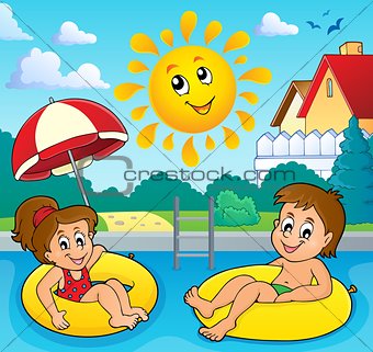 Children in swim rings image 3