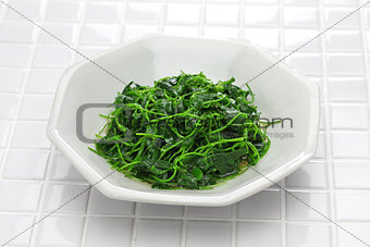 chinese white wine stir fried with toothed bur clover