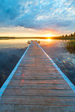 vertical photo of a beautiful landscape - a long wooden pier and