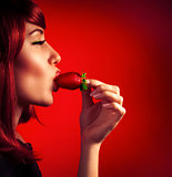 Seductive woman with strawberry