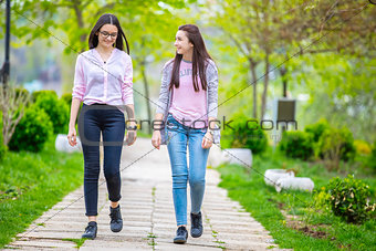 Two sisters having fun in the park