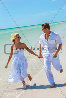 Happy Young Man Woman Couple Running on A Beach
