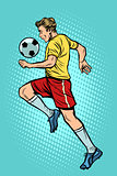 Retro football player with a soccer ball