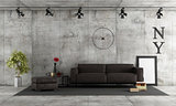 Concrete room with leather sofa