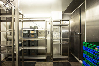Empty restaurant kitchen storage room stainless steel