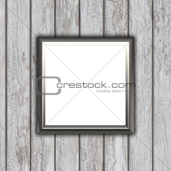 3D blank picture frame on a wooden texture background