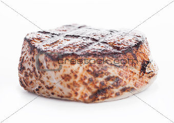 Grilled juicy beef pork steak slice on white