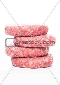 Raw fresh beef burgers on white background