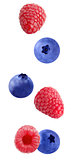  Flying raspberry and blueberry fruits isolated on white backgro