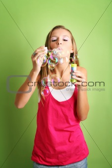 happy woman with flying soap bubbles