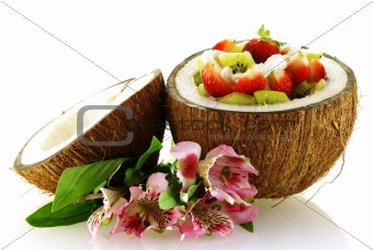 fresh fruit salad served in half coconut