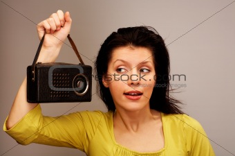 young woman is listening radio