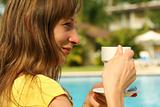 Girl holding cup coffee