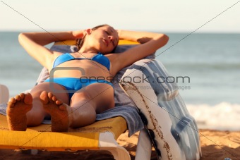 Woman sleeping on the chair